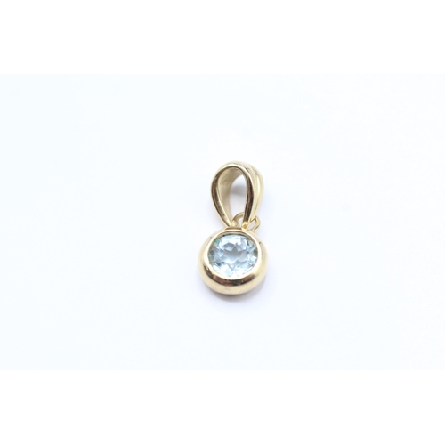 188 - 2 x 9ct gold topaz pendants (1.5g)