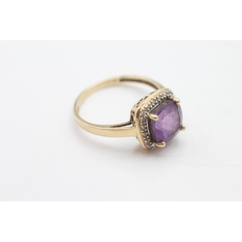 193 - 9ct gold amethyst diamond halo cluster ring (2.7g) Size P