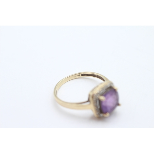 193 - 9ct gold amethyst diamond halo cluster ring (2.7g) Size P