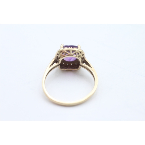 193 - 9ct gold amethyst diamond halo cluster ring (2.7g) Size P