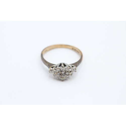 194 - 9ct gold diamond dress ring (2.1g) Size L