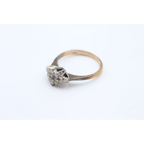 194 - 9ct gold diamond dress ring (2.1g) Size L