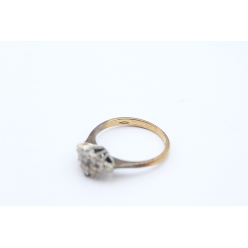 194 - 9ct gold diamond dress ring (2.1g) Size L