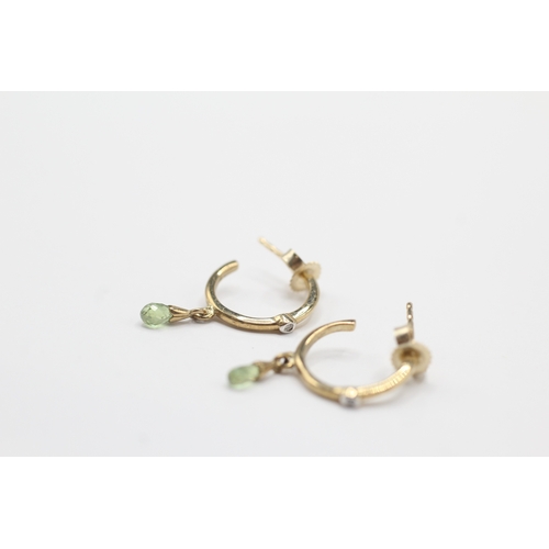 197 - 9ct gold diamond and peridot half hoop earrings (1.3g)
