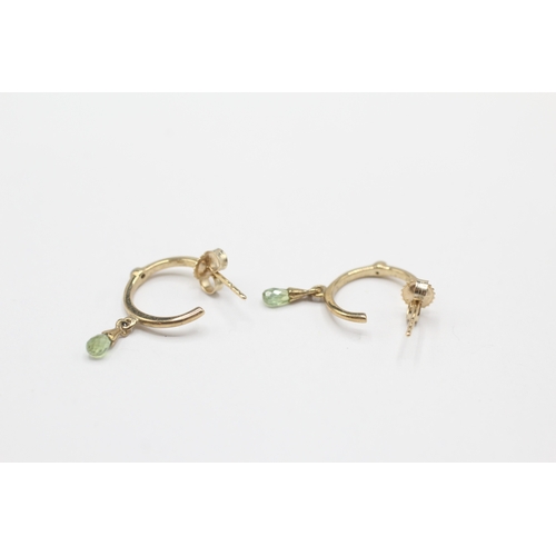 197 - 9ct gold diamond and peridot half hoop earrings (1.3g)