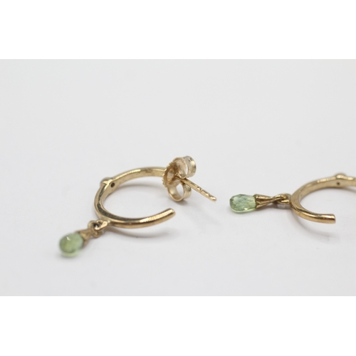 197 - 9ct gold diamond and peridot half hoop earrings (1.3g)