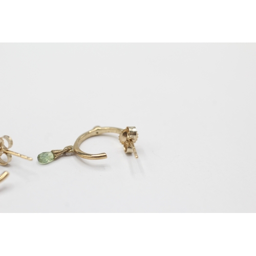 197 - 9ct gold diamond and peridot half hoop earrings (1.3g)