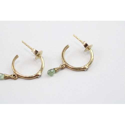 197 - 9ct gold diamond and peridot half hoop earrings (1.3g)