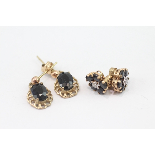 205 - 2 x 9ct gold diamond and sapphire stud earrings (2.9g)