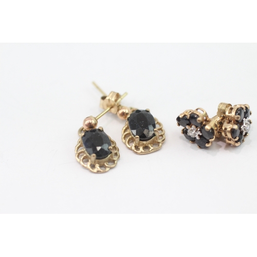 205 - 2 x 9ct gold diamond and sapphire stud earrings (2.9g)