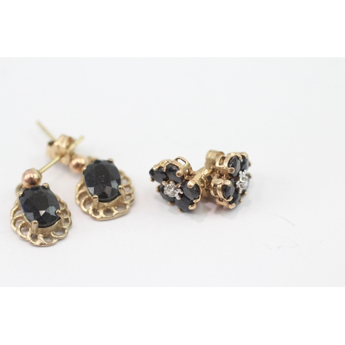 205 - 2 x 9ct gold diamond and sapphire stud earrings (2.9g)