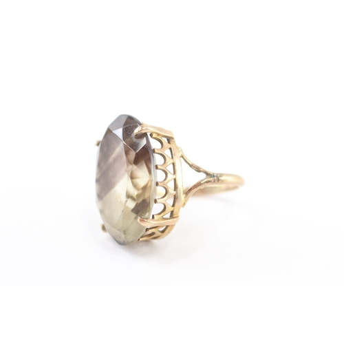206 - 9ct gold smokey quartz cocktail ring (6.2g) Size M