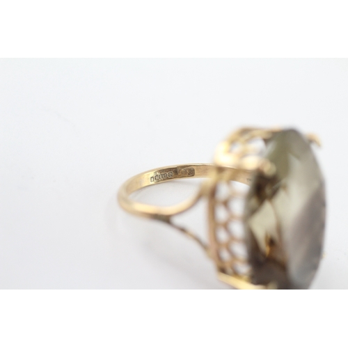 206 - 9ct gold smokey quartz cocktail ring (6.2g) Size M