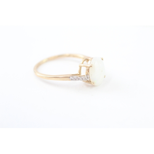 211 - 9ct gold opal and white sapphire dress ring (2.2g) Size P 1/2