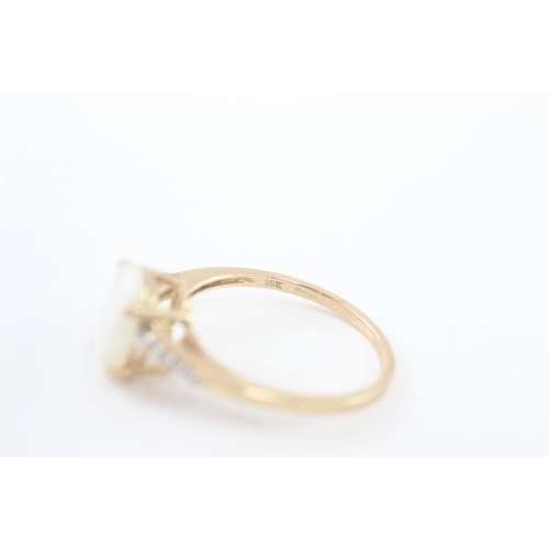 211 - 9ct gold opal and white sapphire dress ring (2.2g) Size P 1/2