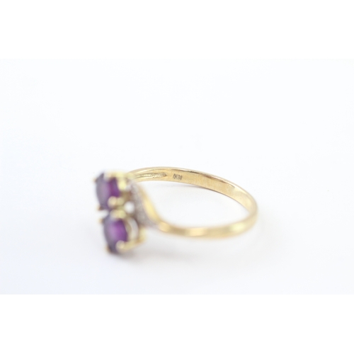 218 - 9ct gold amethyst and diamond twin stone ring (1.7g) Size M