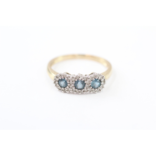 219 - 9ct gold blue topaz & diamond dress ring (2g) Size O