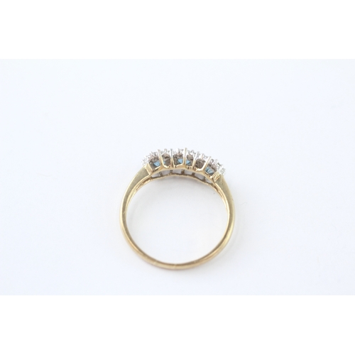 219 - 9ct gold blue topaz & diamond dress ring (2g) Size O