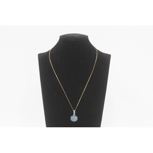 223 - 9ct gold opal triplet & blue topaz pendant necklace (3g)