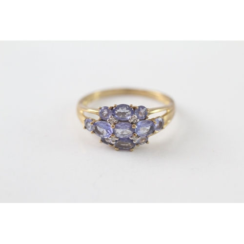 225 - 9ct gold tanzanite & diamond dress ring (2.2g) Size M