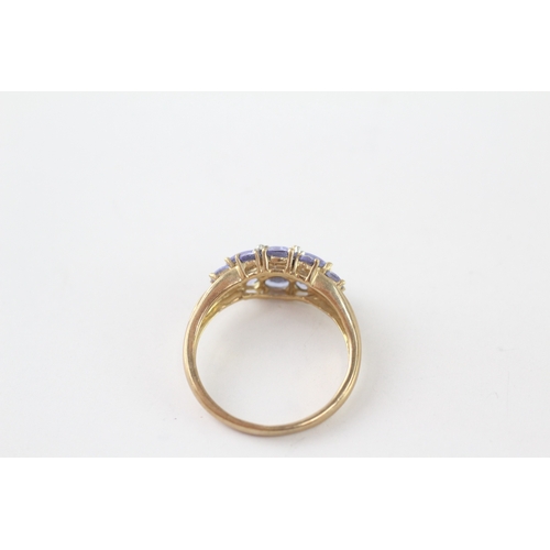 225 - 9ct gold tanzanite & diamond dress ring (2.2g) Size M