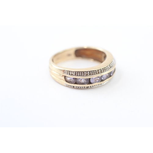 228 - 9ct gold tanzanite & diamond ring (3.1g) Size O