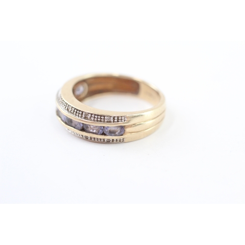 228 - 9ct gold tanzanite & diamond ring (3.1g) Size O