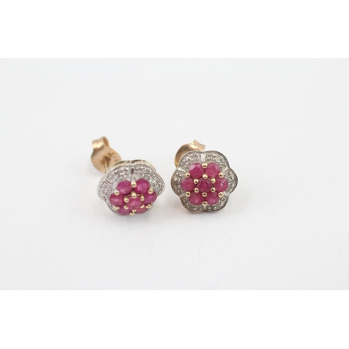 229 - 9ct gold diamond and ruby floral stud earrings (1.7g)