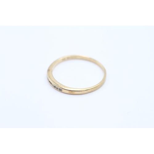 24 - 9ct gold channel set diamond ring (1.2g) Size P