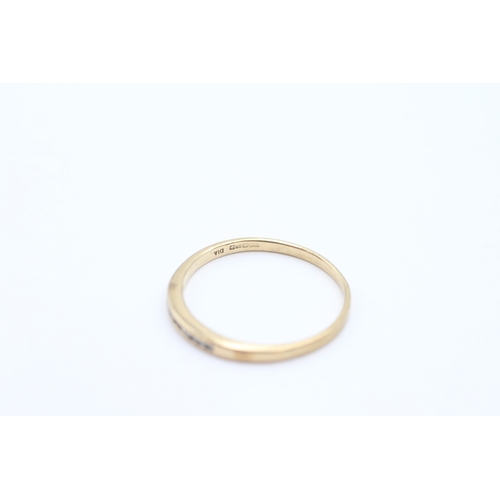24 - 9ct gold channel set diamond ring (1.2g) Size P