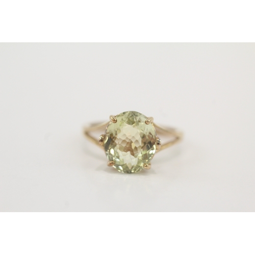 46 - 9ct gold peridot & diamond dress ring (3g) Size N