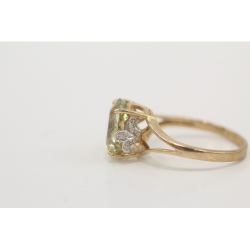 46 - 9ct gold peridot & diamond dress ring (3g) Size N