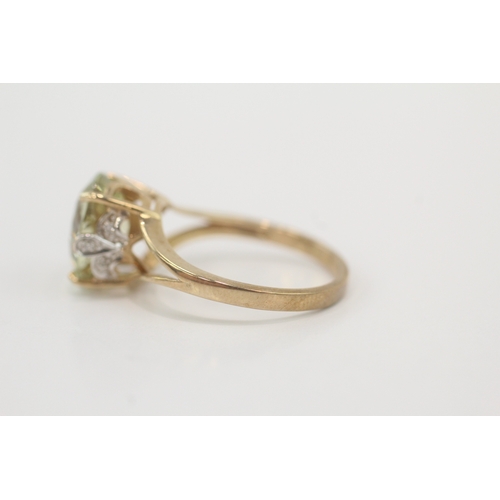 46 - 9ct gold peridot & diamond dress ring (3g) Size N