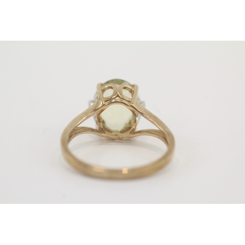 46 - 9ct gold peridot & diamond dress ring (3g) Size N