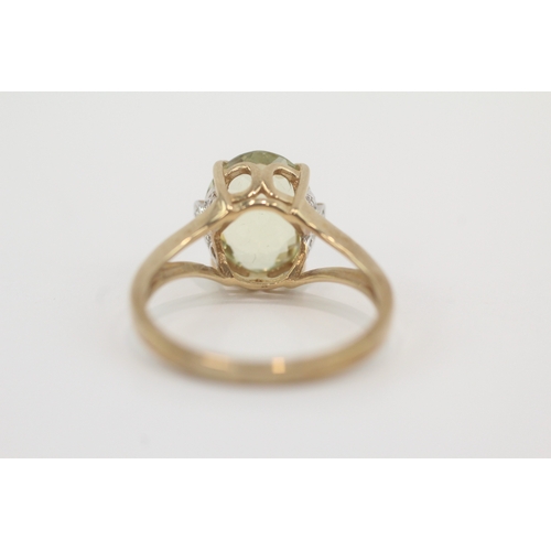 46 - 9ct gold peridot & diamond dress ring (3g) Size N