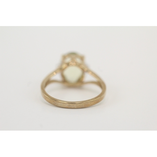 46 - 9ct gold peridot & diamond dress ring (3g) Size N