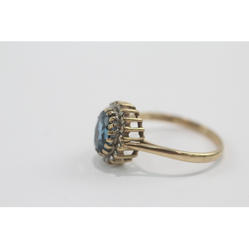 47 - 9ct gold blue topaz & diamond cluster ring (2.8g) Size P