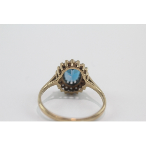 47 - 9ct gold blue topaz & diamond cluster ring (2.8g) Size P