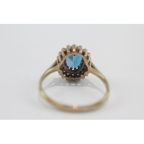 47 - 9ct gold blue topaz & diamond cluster ring (2.8g) Size P