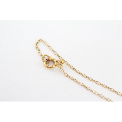 57 - 9ct gold ruby pendant necklace (1.7g)
