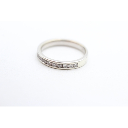 20 - 9ct white gold channel set diamond half eternity ring (2.5g) Size L