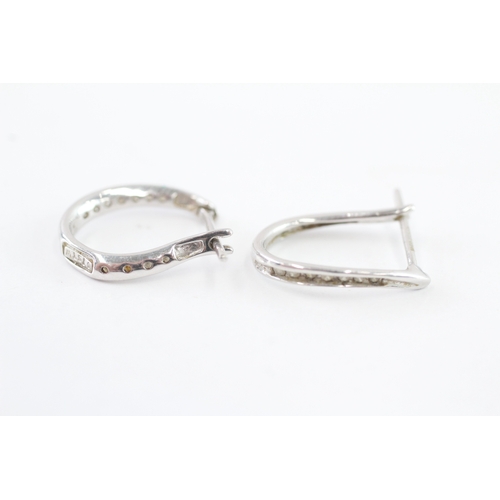 24 - 9ct gold diamond hoop earrings (2.2g)