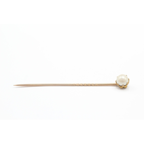 10 - 18ct gold potential natural split pearl stick pin with 9ct pin (2.2g)