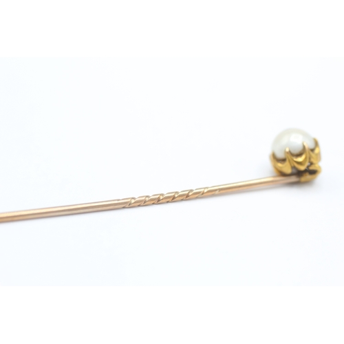 10 - 18ct gold potential natural split pearl stick pin with 9ct pin (2.2g)