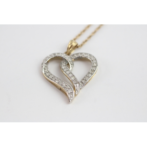 15 - 9ct gold diamond twist heart pendant on chain (3.5g)