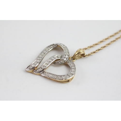15 - 9ct gold diamond twist heart pendant on chain (3.5g)