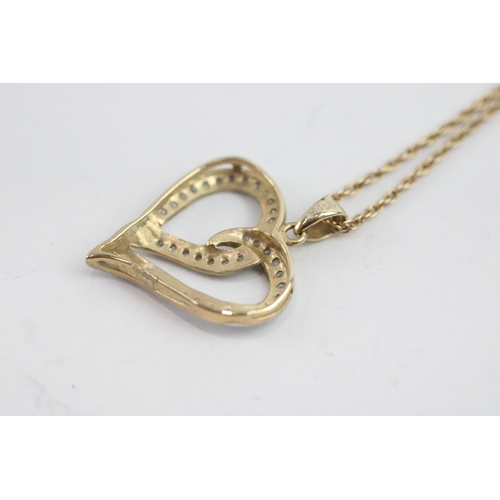 15 - 9ct gold diamond twist heart pendant on chain (3.5g)