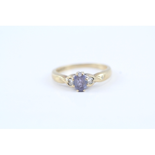 22 - 9ct gold tanzanite & diamond dress ring (2g) Size J