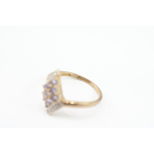 30 - 9ct gold tanzanite & diamond dress ring (2.2g) Size N