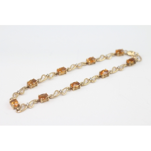 36 - 9ct gold diamond and citrine station bracelet (4.9g)